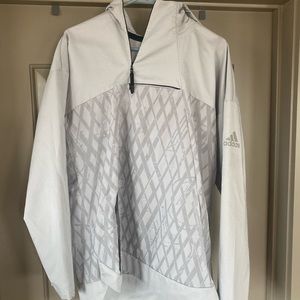 Light grey adidas reflective rain jacket